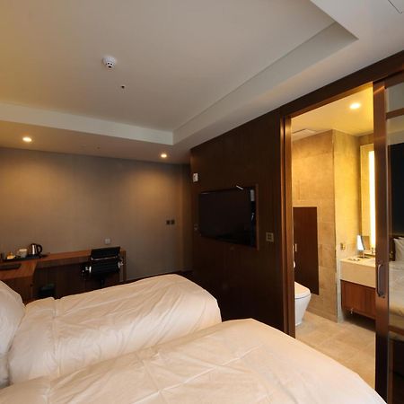 Benikea The H Hotel Hwaseong Номер фото